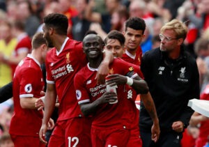 Firmino, Mané e Salah tivceram ainda o contributo de Strurridge, na concretização.